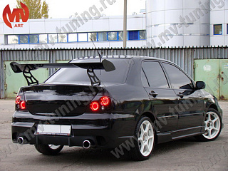Задний бампер Mitsubishi Lancer IX в стиле INGS Extreem под двойной выхлоп (2003-2009)