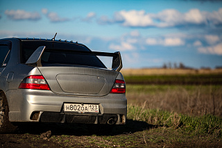 Задний бампер Mitsubishi Lancer 9 IX в стиле EVO (2003-2009)